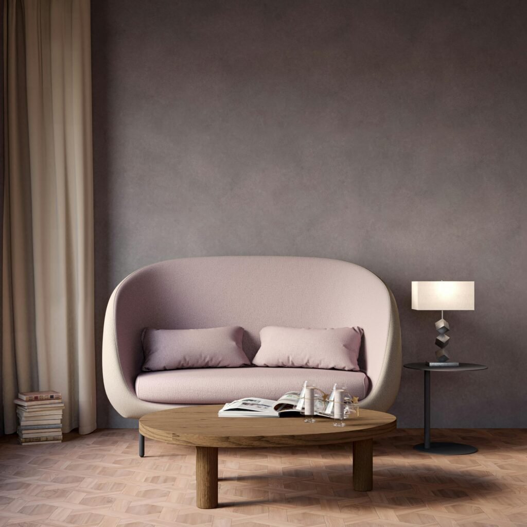 Stylish minimalist living room with modern sofa and elegant decor.